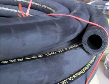 A roll of black hydropower sandblast hose.