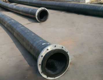 Three sandblast hoses of different lengths are on the ground of our factory.